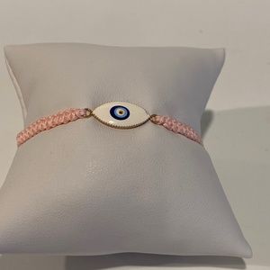Women’s pink macrame evil eye bracelet